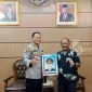 Ketua AJKT, Sukriadi bersama Kapolres Kutai Timur, AKBP Welly Djatmoko.