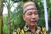 Anggota DPRD Kutai Timur, Arang Jau saat diwawancarai seusai mengikuti peresmian Gedung Asrama Miau Baru (02/11/2022). (foto: istimewa/)