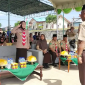 Wakil Ketua DPRD Kutai TImur yang juga Ketua Kwarcab Pramuka Kutai Timur, Asti Mazar saat mengikuti rangkaian pembukaan Orientasi Cross Country di Desa Martadinata (03/11/2022).(foto:/istimewa)
