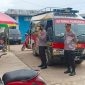 Kasat Binmas Polres Kutai Timur, Iptu SUparmin beserta anggota saat memberikan himbauan kamtibmas di Psaar Induk, Jl Ilham Maulana, Kecamatan Sangatta Utara (16/11/2022).(foro:/dok. Humas Polres Kutim)