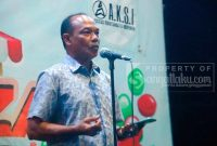 Kepala Dinas Koperasi dan Usaha Kecil Menengah, Darsafani saat memberikan sambupatan pada pembukaan Roadshow Bazar Promosi UMKM di Desa Sekerat, kecamatan Bengalon. (/istimewa)